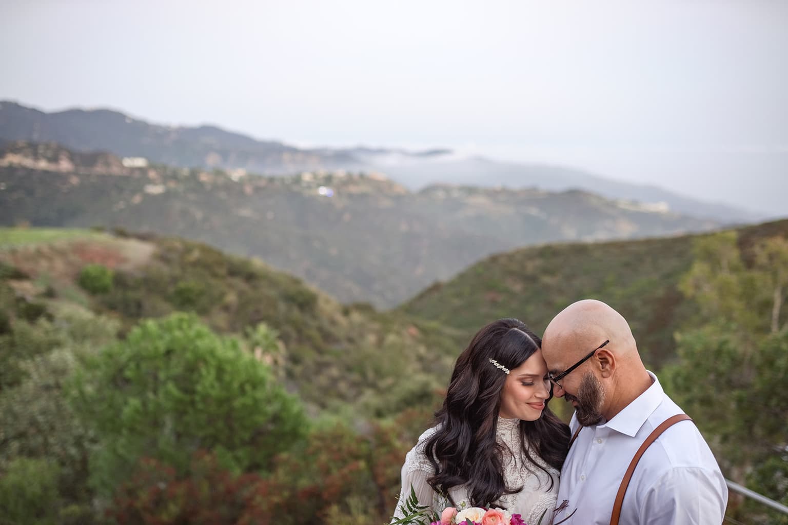 Couple with mountain views at intimate wedding