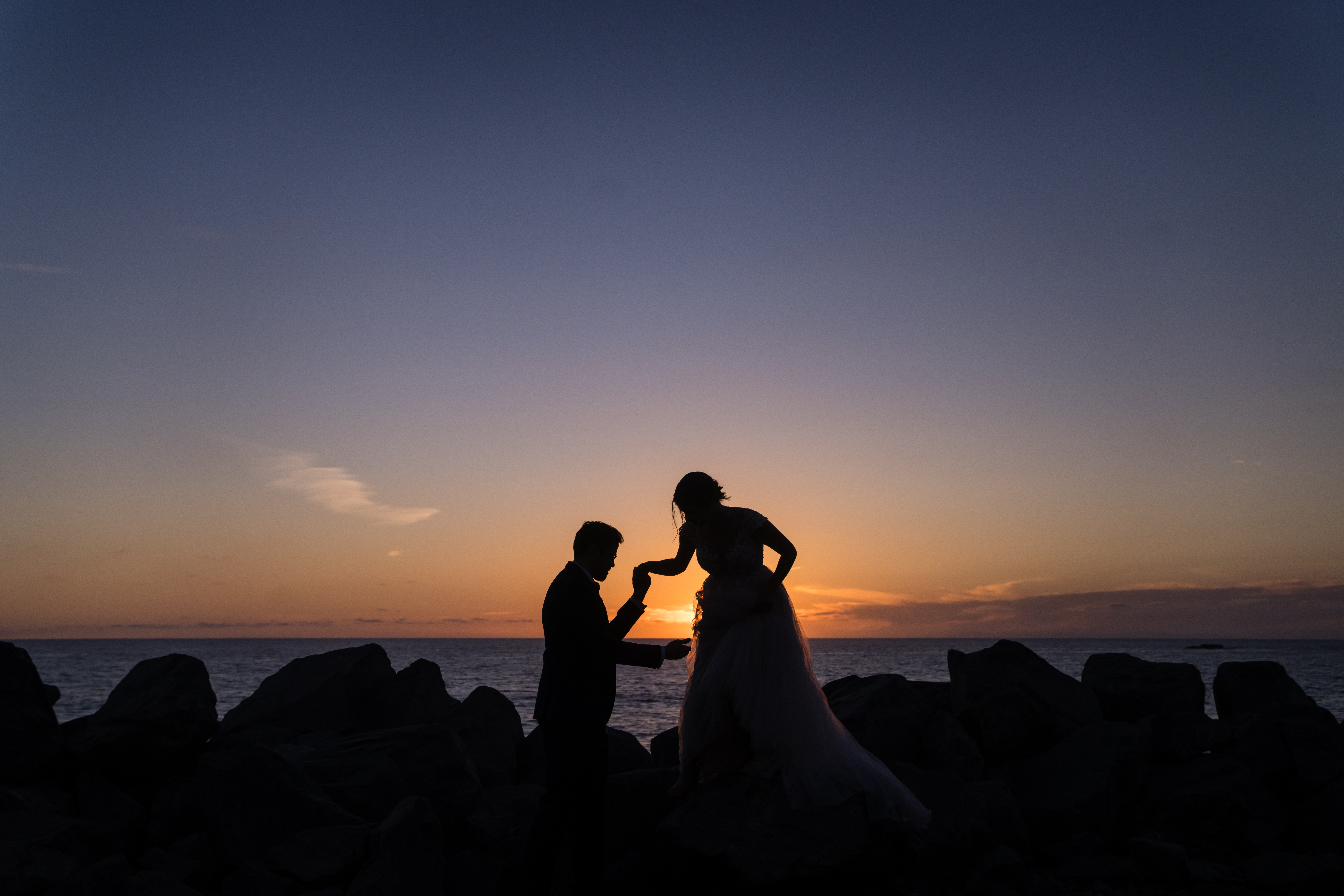 Happy couple celebrating their intimate coastal California micro wedding — natural emotion and love